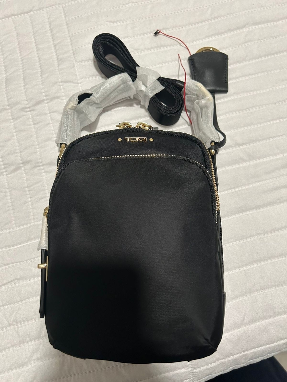 Tumi Black Nylon Crossbody with Gold Hardware